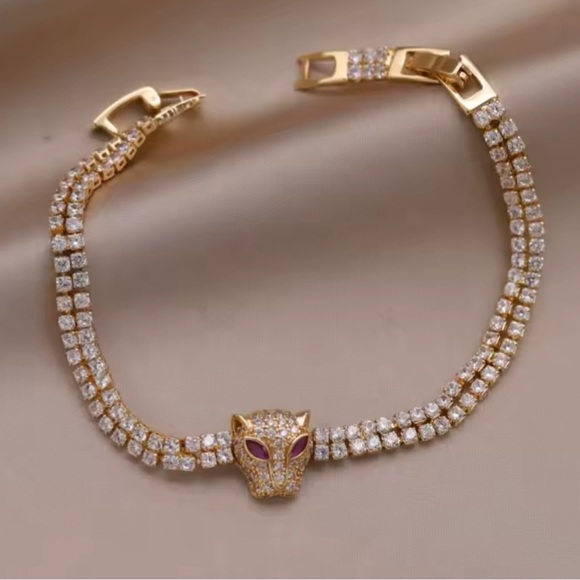 Jewelry - CLEAR PINK CZ PANTHER GOLD TENNIS BRACELET